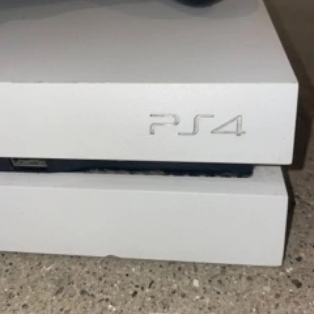 Sony PlayStation 4 Glacier White Console + 2 Wireless DualShock Controllers